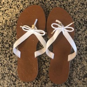 White Kate Spade flip flops